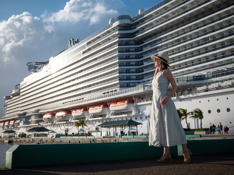 Copenhagen Transportation Service | Best Limousine Service Copenhagen attractive woman on the background of a white ship 2023 11 27 05 33 14 utc